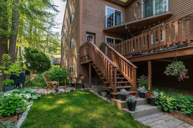 3 Treasure Way Unit 3, Ashland, MA 01721 - back of house featuring a wooden deck, stairs, and a yard