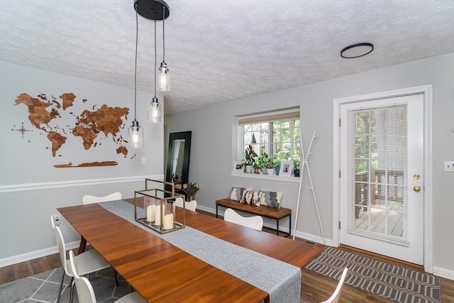 3 Treasure Way Unit 3, Ashland, MA 01721 - dining room featuring a textured ceiling and wood finished floors