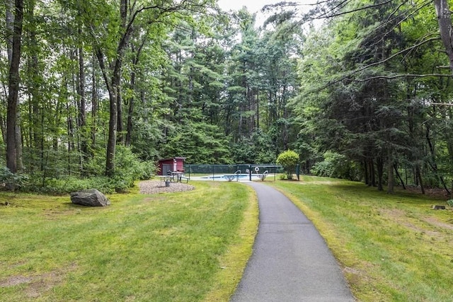 420 Great Rd Unit B9, Acton, MA 01720 - surrounding community with a swimming pool and a forest view