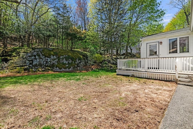 view of yard with a deck