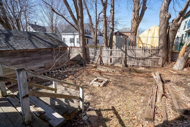 view of yard with a residential view and fence