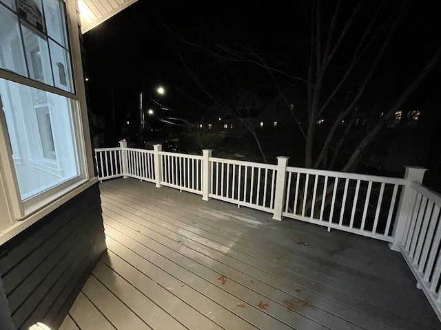 view of deck at twilight