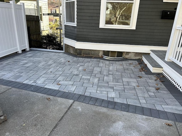 view of patio / terrace featuring fence