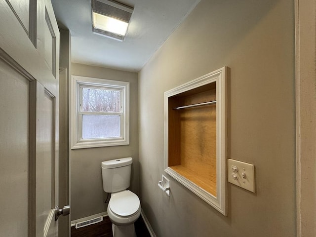 2248 Washington St, East Bridgewater, MA 02333 - bathroom featuring toilet, visible vents, and baseboards