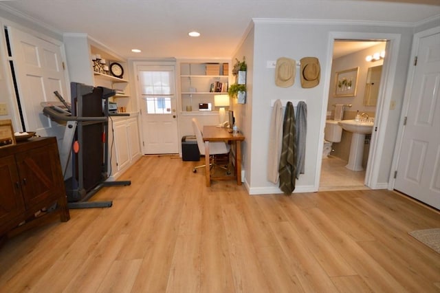 interior space with recessed lighting, baseboards, crown molding, and light wood finished floors