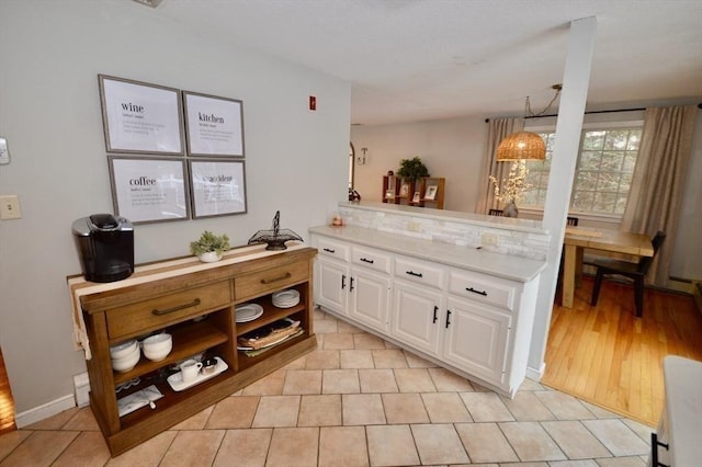 bar with light tile patterned flooring