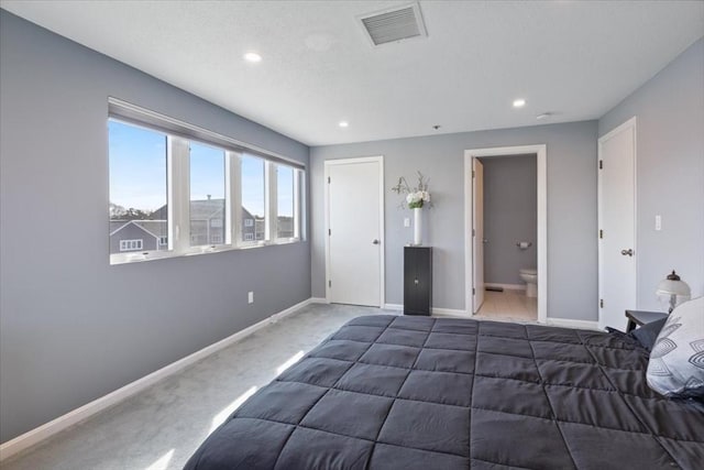 unfurnished bedroom with recessed lighting, visible vents, carpet flooring, and baseboards