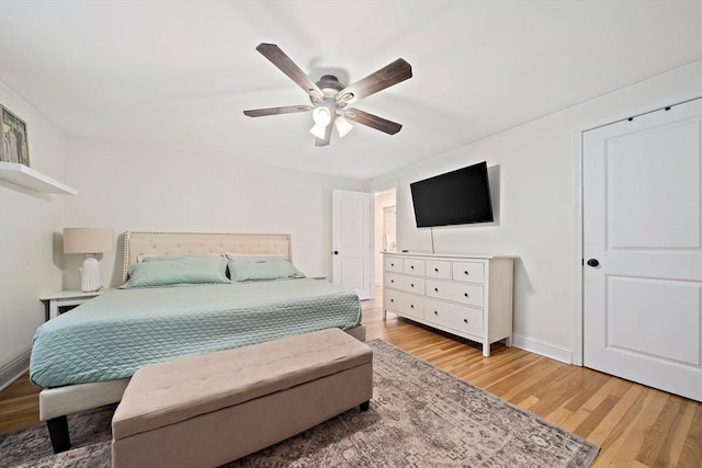359 Corey St, Boston, MA 02132 - bedroom with light wood-type flooring, baseboards, and ceiling fan