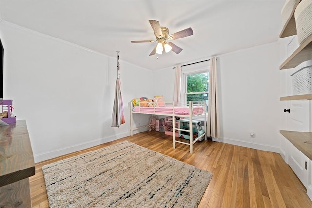 359 Corey St, Boston, MA 02132 - bedroom with wood finished floors, baseboards, a ceiling fan, and crown molding