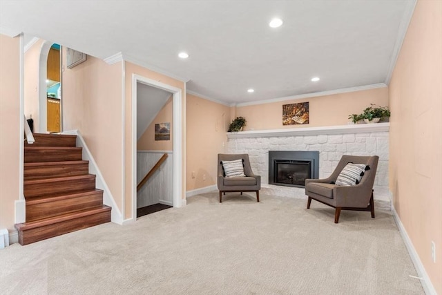 5 Plouff Ln, Exeter, NH 03833 - sitting room featuring carpet, ornamental molding, recessed lighting, baseboards, and a stone fireplace