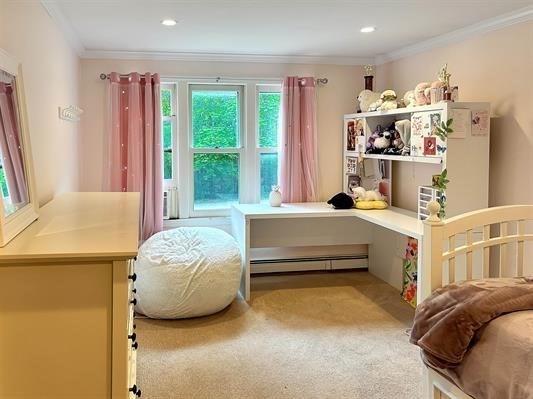 5 Plouff Ln, Exeter, NH 03833 - carpeted bedroom with a baseboard heating unit and crown molding