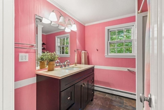 5 Plouff Ln, Exeter, NH 03833 - bathroom featuring a baseboard heating unit, vanity, stone finish flooring, and ornamental molding
