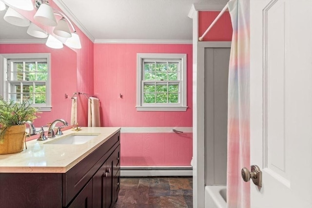 5 Plouff Ln, Exeter, NH 03833 - full bath with a baseboard radiator, stone finish floors, vanity, crown molding, and baseboards