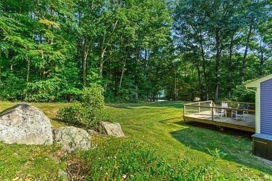 5 Plouff Ln, Exeter, NH 03833 - view of grassy yard with a deck
