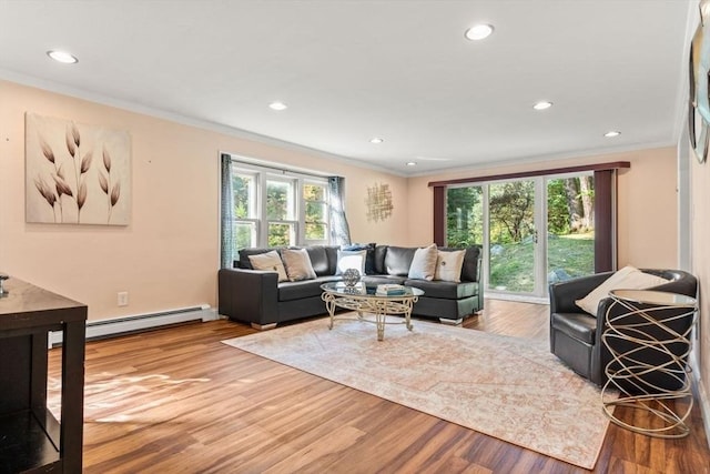 5 Plouff Ln, Exeter, NH 03833 - living area featuring ornamental molding, plenty of natural light, wood finished floors, a baseboard radiator, and recessed lighting