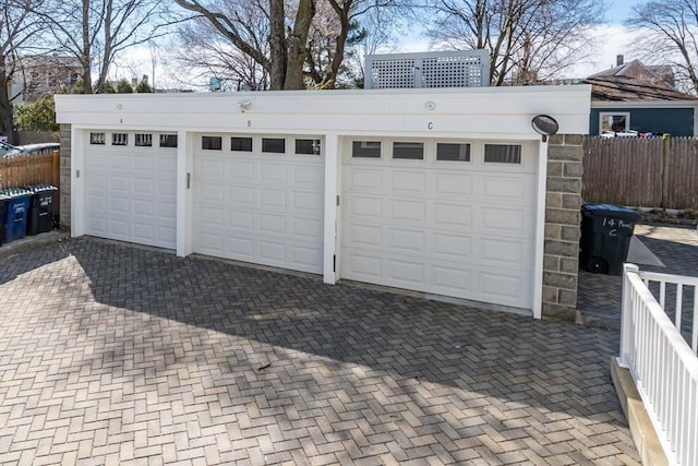 garage featuring fence