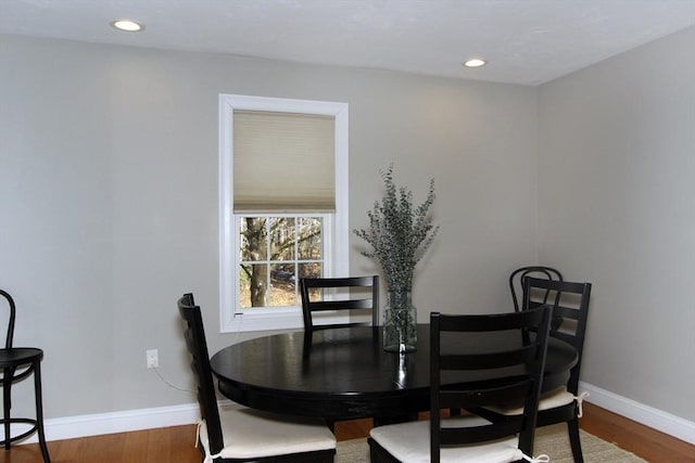 dining area featuring wood-type flooring