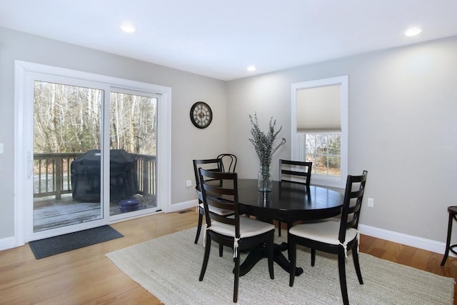 dining space featuring light hardwood / wood-style floors