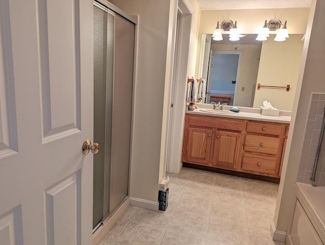 239 Bridle Cross Rd Unit 239, Fitchburg, MA 01420 - full bathroom with a stall shower, vanity, tile patterned floors, and baseboards