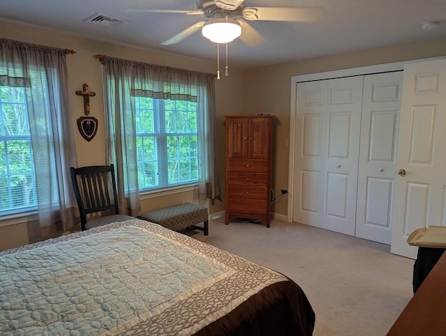 239 Bridle Cross Rd Unit 239, Fitchburg, MA 01420 - bedroom featuring light colored carpet, a closet, ceiling fan, and baseboards