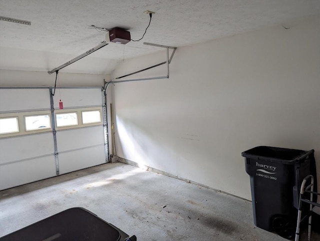 239 Bridle Cross Rd Unit 239, Fitchburg, MA 01420 - garage featuring a garage door opener