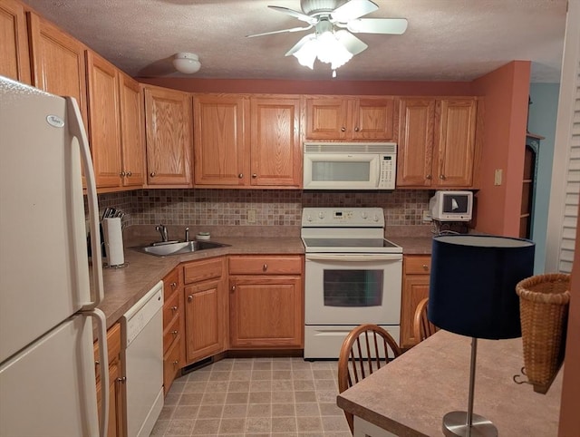 239 Bridle Cross Rd Unit 239, Fitchburg, MA 01420 - kitchen featuring white appliances, a sink, decorative backsplash, a ceiling fan, and light countertops