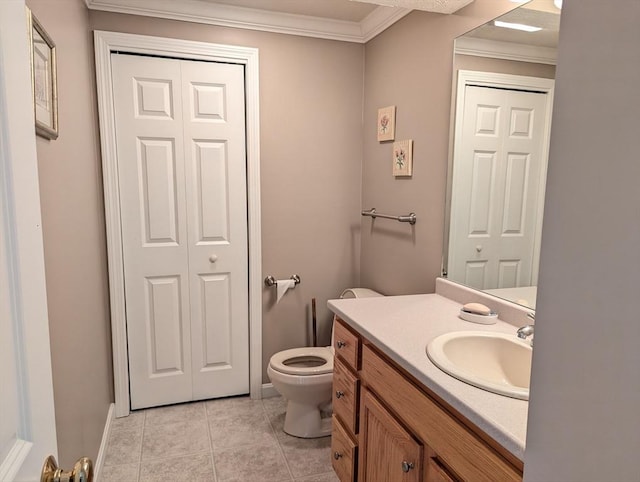 239 Bridle Cross Rd Unit 239, Fitchburg, MA 01420 - bathroom with toilet, crown molding, vanity, tile patterned flooring, and baseboards