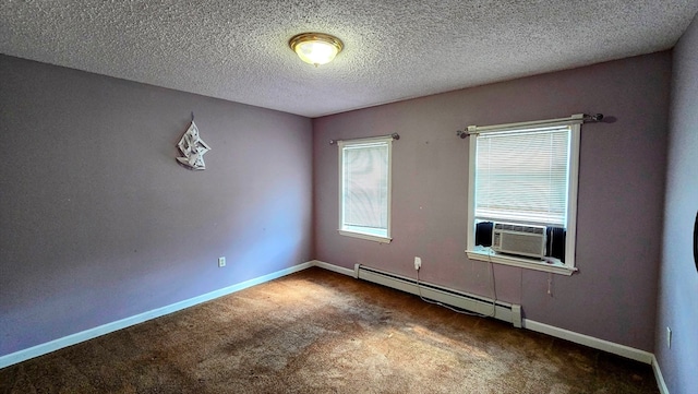 spare room featuring dark carpet, a baseboard radiator, and a textured ceiling