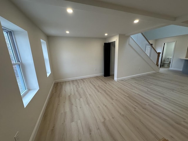 interior space featuring plenty of natural light and light hardwood / wood-style flooring