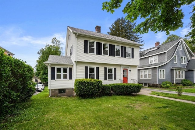 229 May St, Worcester, MA 01602 - colonial-style house featuring a front yard and a chimney