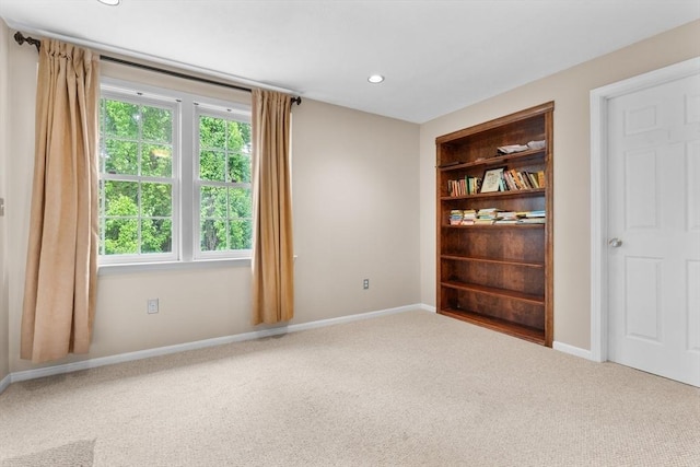 7 Hovey Pond Dr Unit 7, Grafton, MA 01536 - carpeted empty room with baseboards, recessed lighting, and built in shelves