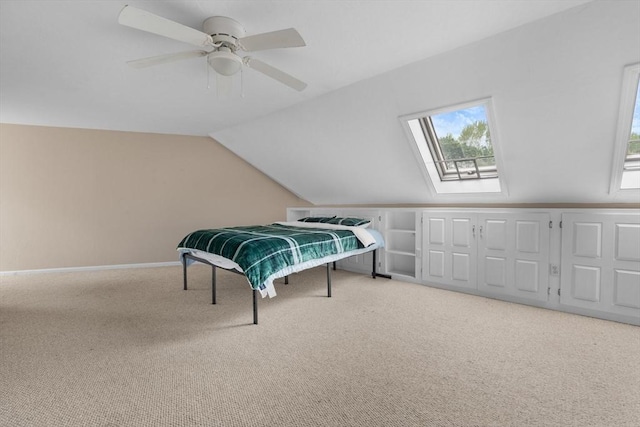 7 Hovey Pond Dr Unit 7, Grafton, MA 01536 - bedroom featuring carpet floors, lofted ceiling, a skylight, ceiling fan, and baseboards