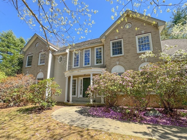 view of front of home with brick siding