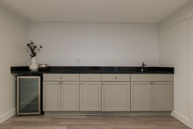 74 Dedham St, Newton, MA 02461 - indoor dry bar featuring wine cooler and light wood-style floors