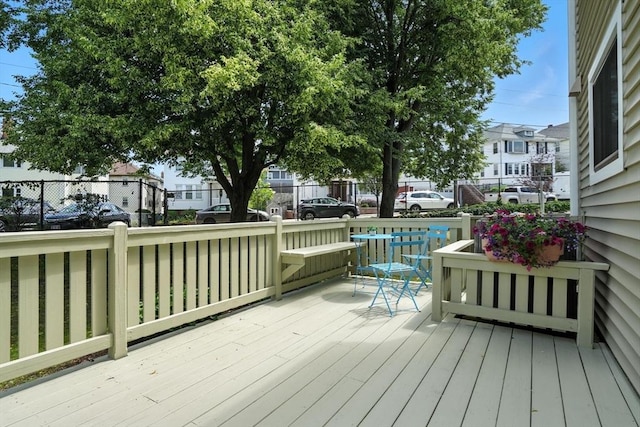 109 Governor Winthrop Rd Unit 109, Somerville, MA 02145 - wooden terrace with a residential view