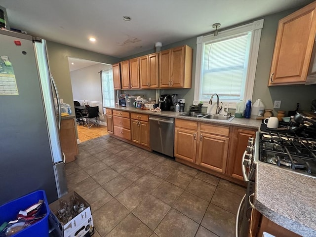 14 Waldo Ct, Haverhill, MA 01835 - kitchen with stainless steel appliances, dark tile patterned flooring, recessed lighting, and plenty of natural light
