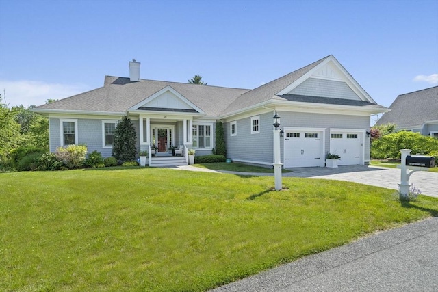 31 Chittenden Ln Unit 31, Cohasset, MA 02025 - view of front of property featuring a chimney, a garage, a front lawn, driveway, and roof with shingles