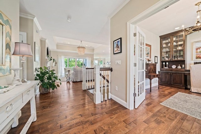31 Chittenden Ln Unit 31, Cohasset, MA 02025 - corridor with ornamental molding, hardwood / wood-style flooring, a chandelier, recessed lighting, and a raised ceiling