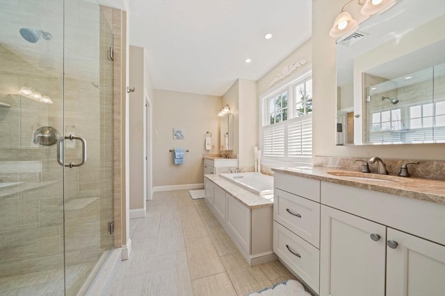 31 Chittenden Ln Unit 31, Cohasset, MA 02025 - bathroom featuring a shower stall, two vanities, and recessed lighting
