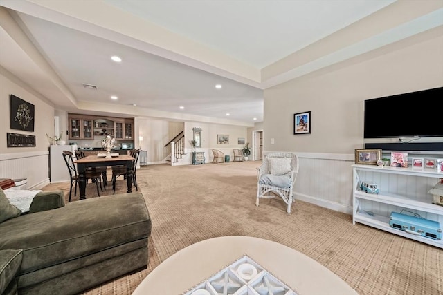 31 Chittenden Ln Unit 31, Cohasset, MA 02025 - carpeted living area featuring stairway, a wainscoted wall, recessed lighting, and a tray ceiling