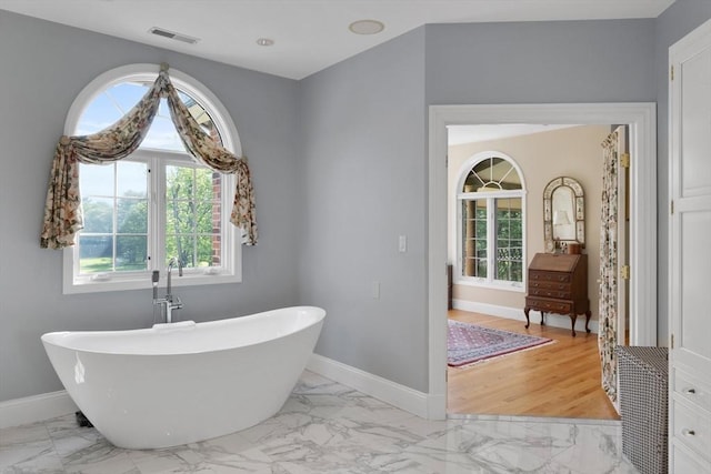 11 Fairway Dr, Andover, MA 01810 - full bathroom with marble finish flooring and a soaking tub