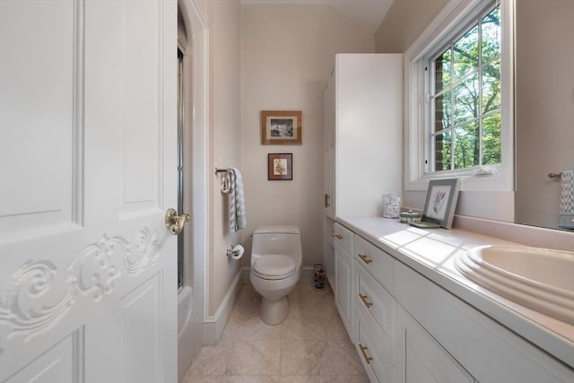 11 Fairway Dr, Andover, MA 01810 - bathroom featuring vanity, lofted ceiling, tile patterned floors, and a tub to relax in