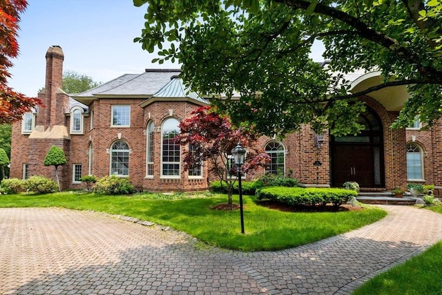 11 Fairway Dr, Andover, MA 01810 - view of front of property featuring a front lawn, a chimney, and brick siding