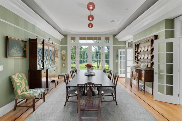 11 Fairway Dr, Andover, MA 01810 - dining area featuring french doors, wood finished floors, and a raised ceiling