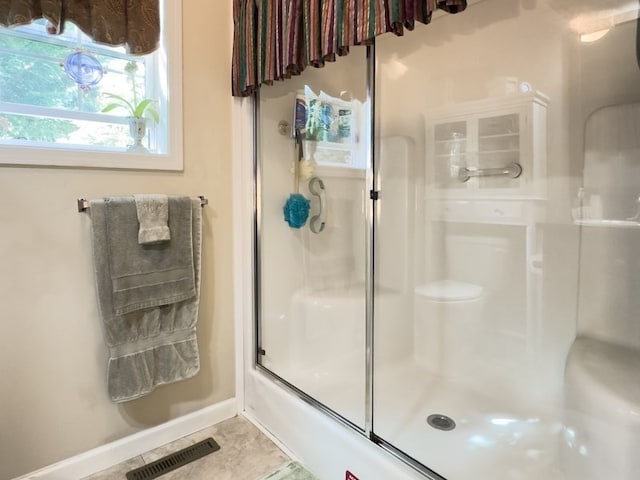 bathroom with tile patterned flooring