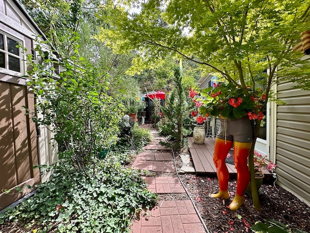 view of yard with a wooden deck