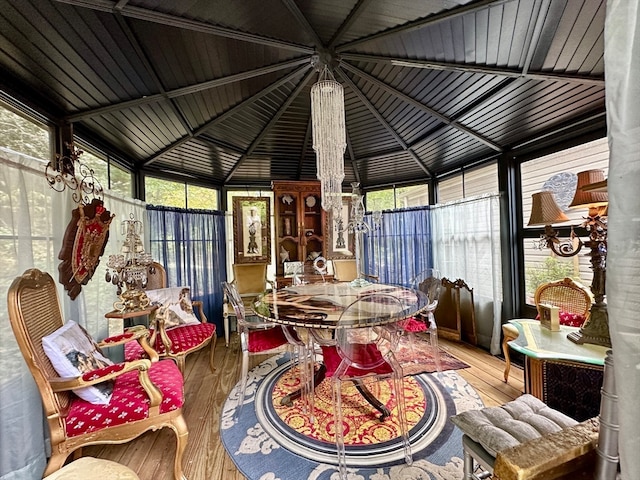 sunroom with lofted ceiling