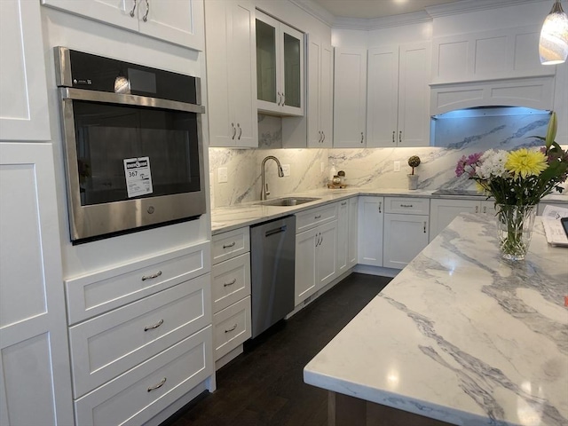 206 W Main Unit 3, Georgetown, MA 01833 - kitchen with stainless steel dishwasher, a sink, white cabinetry, and light stone countertops