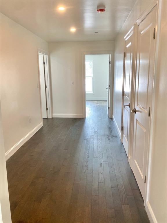 206 W Main Unit 3, Georgetown, MA 01833 - hall with dark wood finished floors and baseboards
