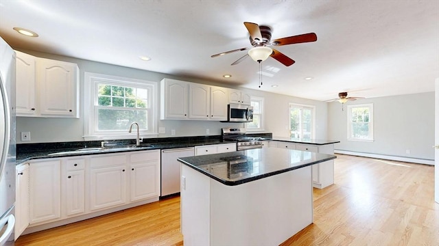 12 Prouty Ln, Rutland, MA 01543 - kitchen featuring stainless steel appliances, baseboard heating, a sink, healthy amount of natural light, and recessed lighting
